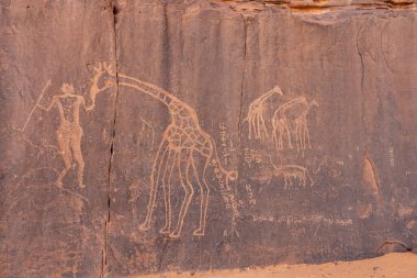 Çölde kaya resmi, Tadrart Rouge 'da Bouhadian kayaları, Tassili N' Ajjer Ulusal Parkı. Sahara