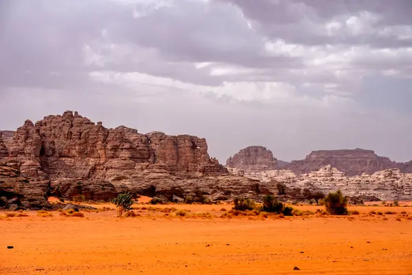 stock image The Tadrart Rouge means Red Mountain. It is a mountain range in southeastern Algeria. The area has a rich array of rock art.