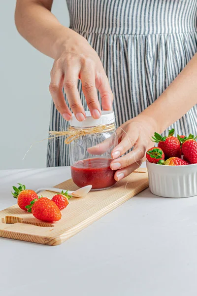Young Female Hand Holding Jar Strawberry Marmalade — Stock Photo, Image