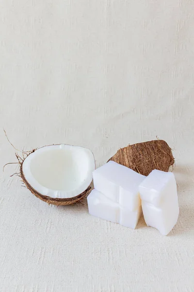 Coconut, coconut soap on white background. Eco cleaning. Natural spring cleaning. Eco friendly concept.