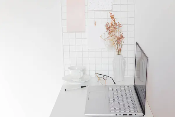 Aesthetic minimalist home office desk workspace on white background.