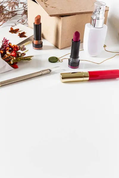 Beauty collage with cosmetics and accessories on white background. Flat lay, top view. Modern woman concept.