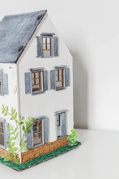 Cropped shot of Doll house. Miniature handmade house.