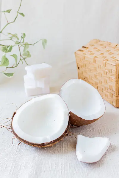 Coconut, coconut soap on white background. Eco cleaning. Natural spring cleaning. Eco friendly concept.