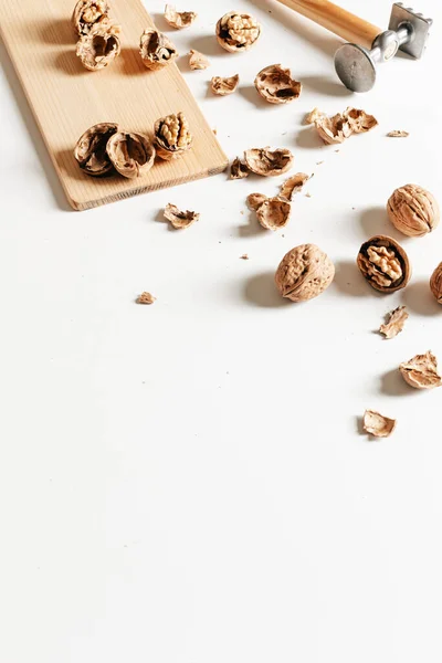 Autumn Composition Walnuts Empty Shells Wooden Board White Background — Stock Photo, Image