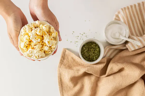 Top View Female Hands Holding Plate Full Popcorn — Stock Photo, Image