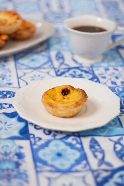 Nata Pastel. Food styling. Aesthetic composition.  Cup of coffee with egg tart dessert