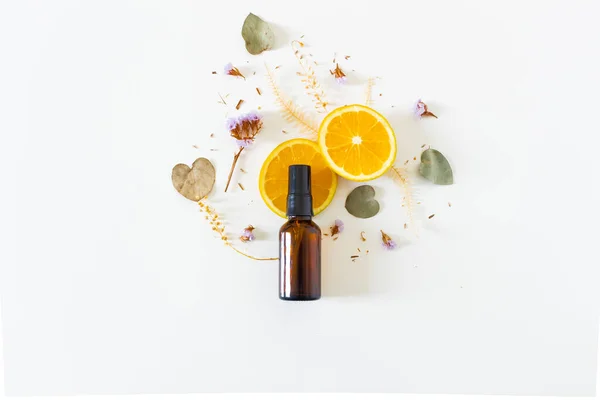 Beauty Spa Beige Composition Amber Bottle Orange Slices Eucalyptus Flowers — Stock Photo, Image