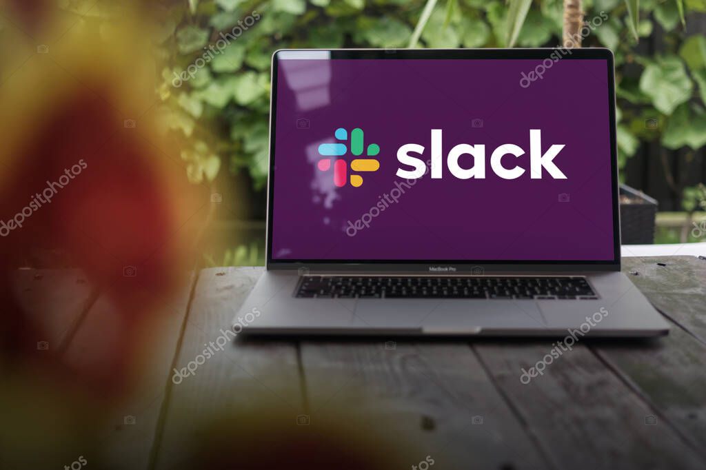 WROCLAW, POLAND - OCTOBER 2, 2023:Slack logo, a cloud-based freemium cross-platform instant messaging service, displayed on a MacBook Pro screen