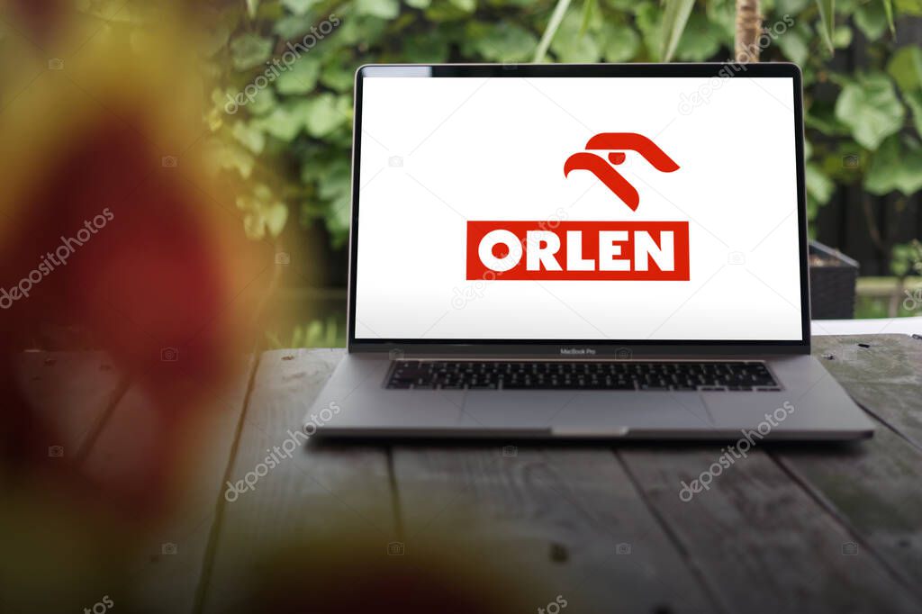 WROCLAW, POLAND - FEBRUARY 23, 2024:Orlen logo, Polish multinational oil refiner and petrol retailer, displayed on MacBook Pro screen
