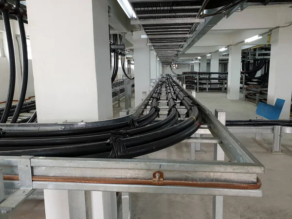 22kV Electrical power cable installation in cable room of substation.
