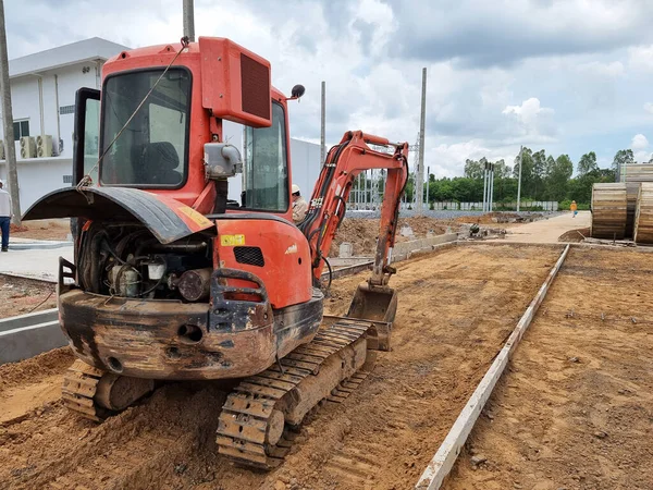 Mini Hydraulic Excavator or diggers prepare the road area in the substation construction