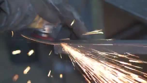 Worker Cutting Metal Grinder Sparks While Grinding Iron Industrial Workshop — Stock Video