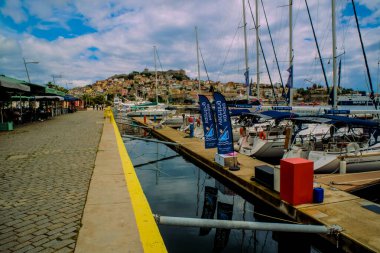 View of Fishing boats in the harbor, Dock for boats and yachts in Kavala city in Greece clipart