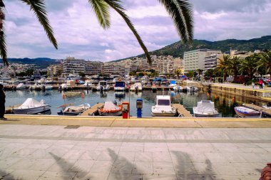 View of Fishing boats in the harbor, Dock for boats and yachts in Kavala city in Greece clipart