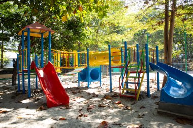 a colorful children's playground in a park