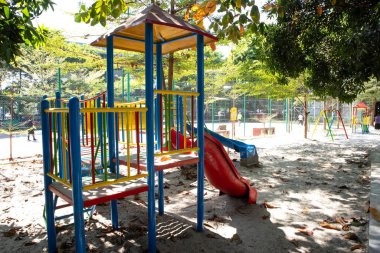 a colorful children's playground in a park