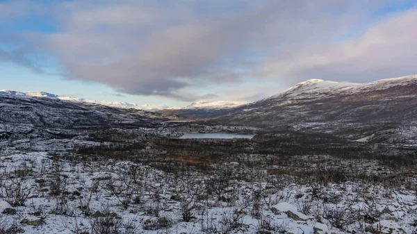 stock image A small lake in winter fell landscape in Northern Norway