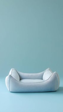 A soft, light blue pet bed on a pastel background. clipart