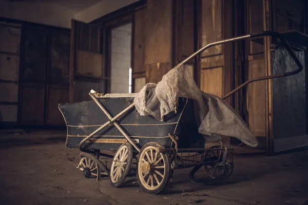 old abandoned cart with a ghost in the abandoned house