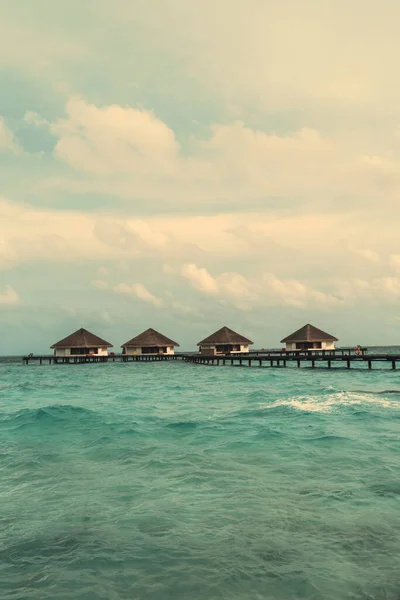 Vertical Shot Row Four Typical Overwater Bungalows Triangle Canopy Roofs — Foto de Stock