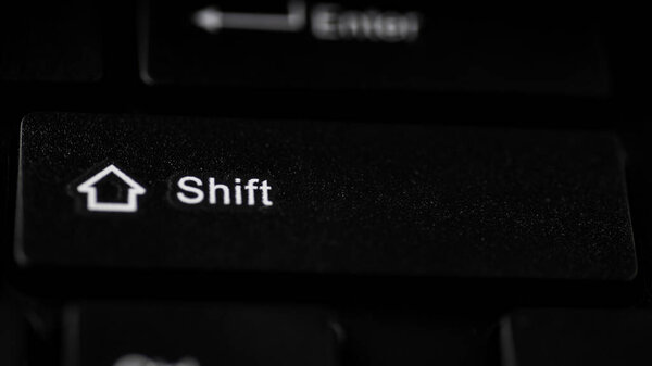 Close up shot of Shift button on a computer keyboard, shallow depth of field
