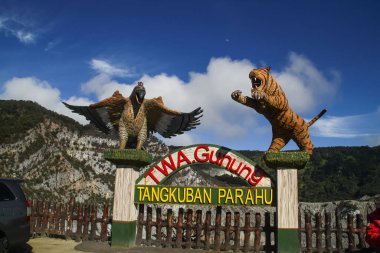 Bandung, Indonesia - July 7, 2020: A statue landmark of Mount Tangkuban Perahu. clipart