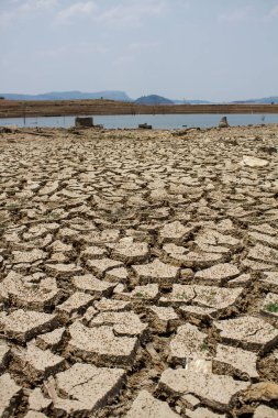 Canal middle agricultural dry by drought and heatwave on summer in Indonesia. water crisis and water stress on summer during long term drought on summer. clipart