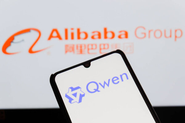 Bandung, Indonesia - September 24, 2025: In this photo illustration, QWEN AI logo is displayed on a smartphone with Alibaba logo in the background.