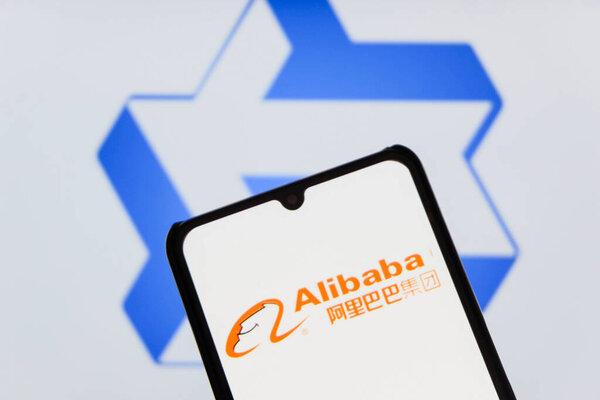Bandung, Indonesia - September 24, 2025: In this photo illustration, QWEN AI logo is displayed on a smartphone with Alibaba logo in the background.