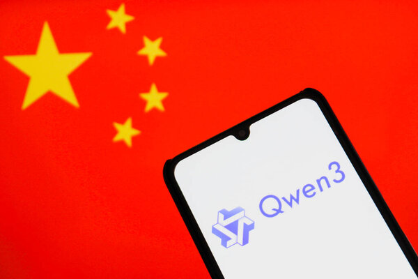 Bandung, Indonesia - September 24, 2025: In this photo illustration, QWEN AI logo is displayed on a smartphone with Alibaba logo in the background.