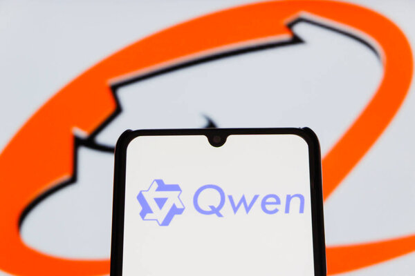 Bandung, Indonesia - September 24, 2025: In this photo illustration, QWEN AI logo is displayed on a smartphone with Alibaba logo in the background.
