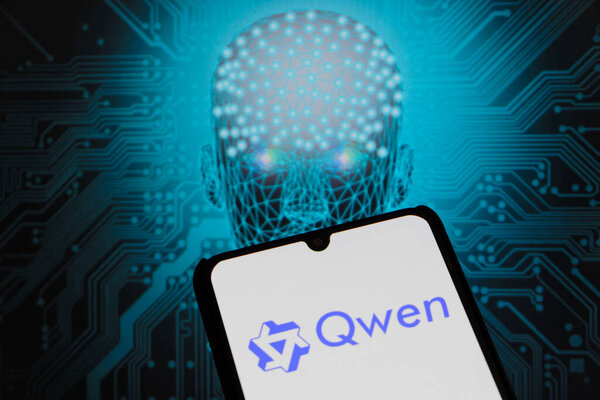 Bandung, Indonesia - September 24, 2025: In this photo illustration, QWEN AI logo is displayed on a smartphone with Alibaba logo in the background.