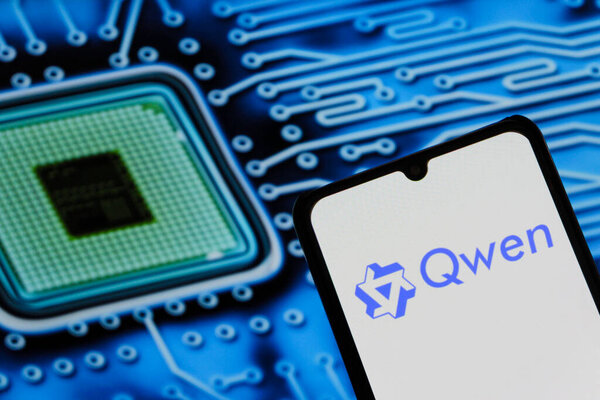 Bandung, Indonesia - September 24, 2025: In this photo illustration, QWEN AI logo is displayed on a smartphone with Alibaba logo in the background.