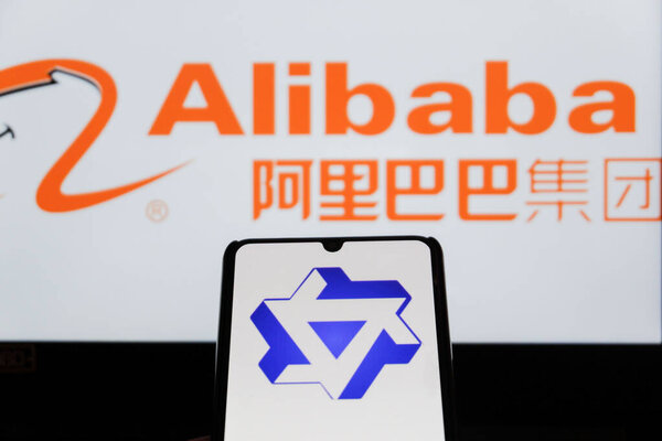 Bandung, Indonesia - September 24, 2025: In this photo illustration, QWEN AI logo is displayed on a smartphone with Alibaba logo in the background.