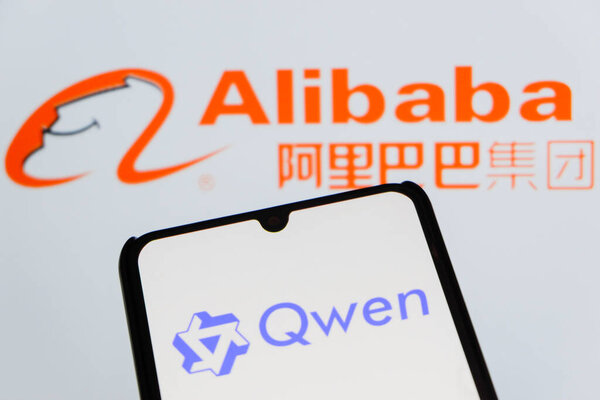 Bandung, Indonesia - September 24, 2025: In this photo illustration, QWEN AI logo is displayed on a smartphone with Alibaba logo in the background.
