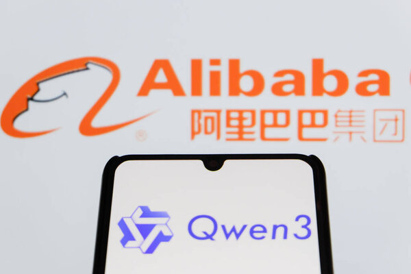 Bandung, Indonesia - September 24, 2025: In this photo illustration, QWEN AI logo is displayed on a smartphone with Alibaba logo in the background.