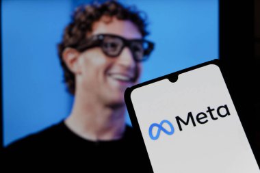 Bandung, Indonesia - September 25, 2025: In this photo illustration, Meta logo is displayed on a smartphone with national flag US in the background.