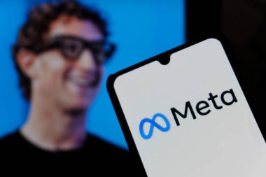 Bandung, Indonesia - September 25, 2025: In this photo illustration, Meta logo is displayed on a smartphone with national flag US in the background.