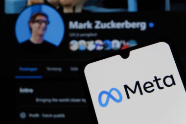 Bandung, Indonesia - September 25, 2025: In this photo illustration, Meta logo is displayed on a smartphone with national flag US in the background.