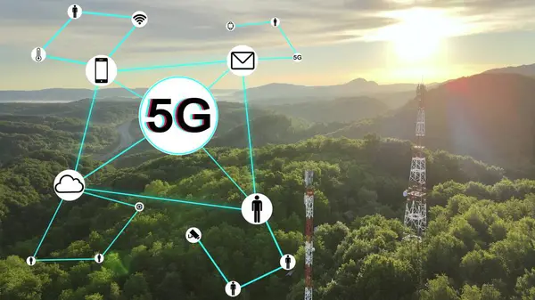 Telecommunication transmission towers with graphics of 5G connection. Future concept of global connectivity with technology