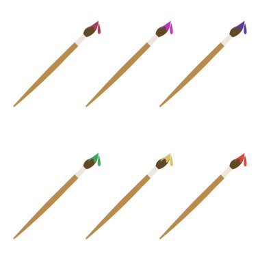 Düz bir arkaplan karşısında çeşitli boya uygulamalarına sahip sanatsal fırçalar