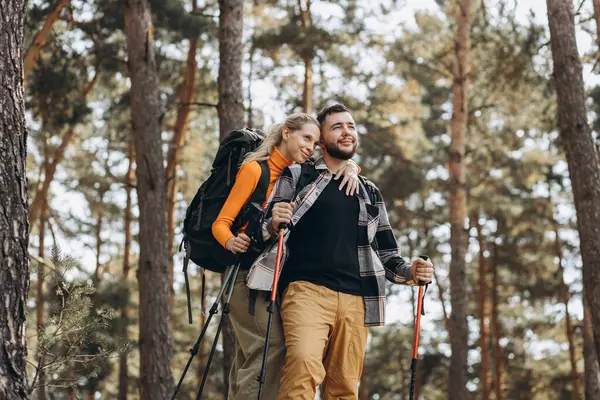 Couple Hiking Bags Walking Sticks Forest — Stock Photo, Image