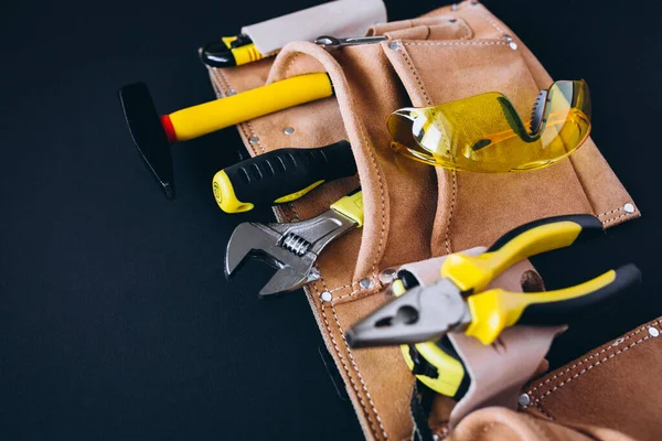 Set of tools isolated in a tool belt