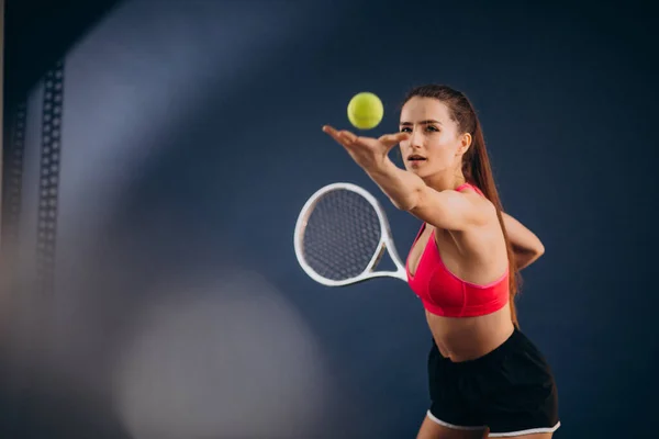 Young woman tennis player isolated at studio