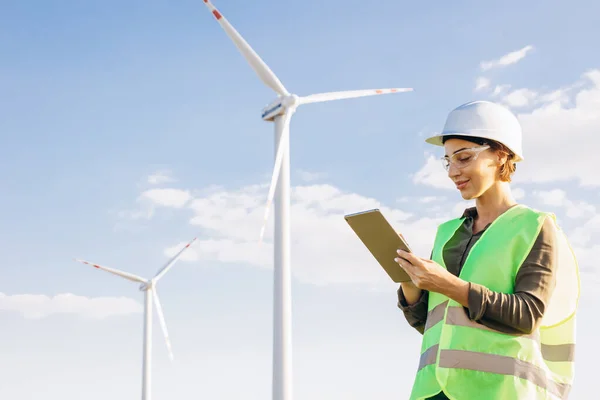 Woman Working Tablet Controlling Functioning Wind Turbines — Stock Photo, Image