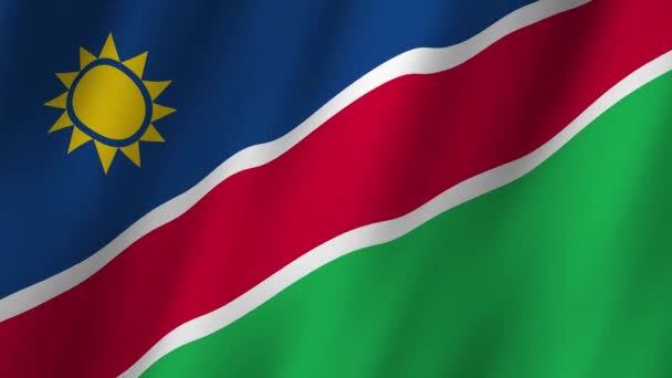 ナミビアの国旗 3Dナミビア国旗が掲げられています ナミビアのフラッグ ビデオが風に揺れている ナミビアの国旗 アニメーション — ストック動画