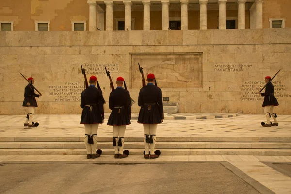 stock image ATHENS, GREECE. 25 OCTOBER  2021.   Changing of the guard ceremony in front of the Greek Parliament building and the monument to the Unknown Soldier in Syntagma Square, Athens, Greece.