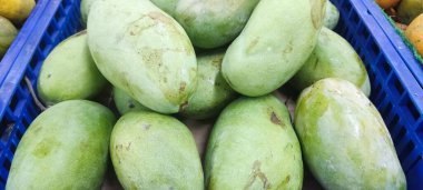 Mango arka planı ve pazardan taze doku