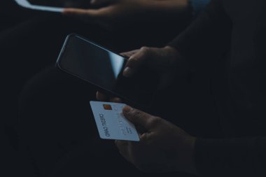 Close up of woman hand using credit card and laptop for payment and online shopping, Online shopping, payments digital banking, E-commerce concept.